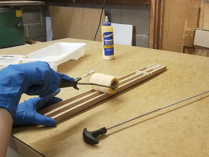 Applying glue to a Stellar pre bored flute kit - www.stellarflutes.com